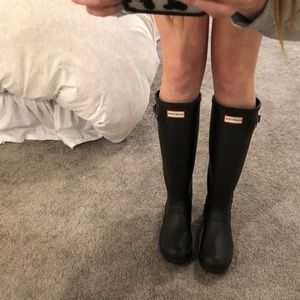 Tall black Hunter rain boots